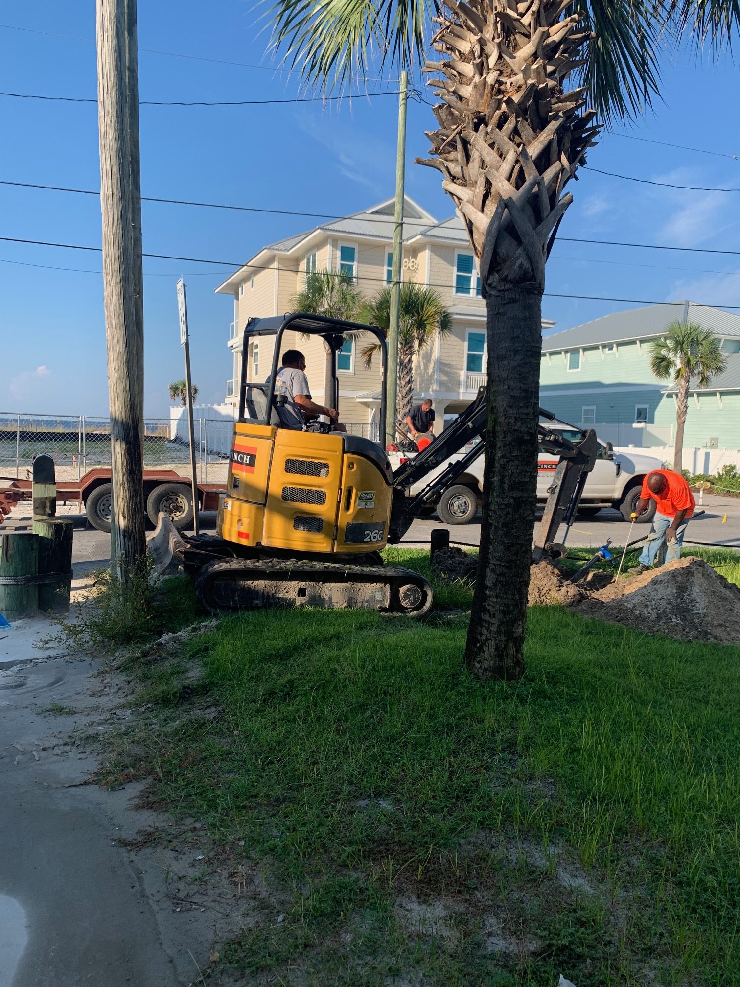 PEAK field crew working beside excavation equipment